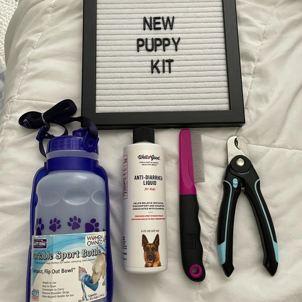 New puppy dog pet kit water bottle flea comb nail clippers antidiarrhea medicine